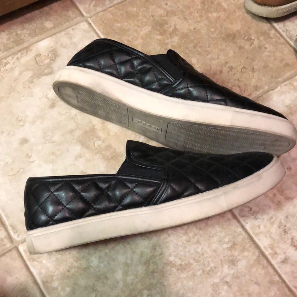 Black slip on like Steve Madden ones